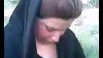Hijabi Arab Woman'S Outdoor Encounter
