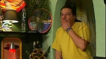 Two Men Have Sex With A Blonde Woman In A Bar